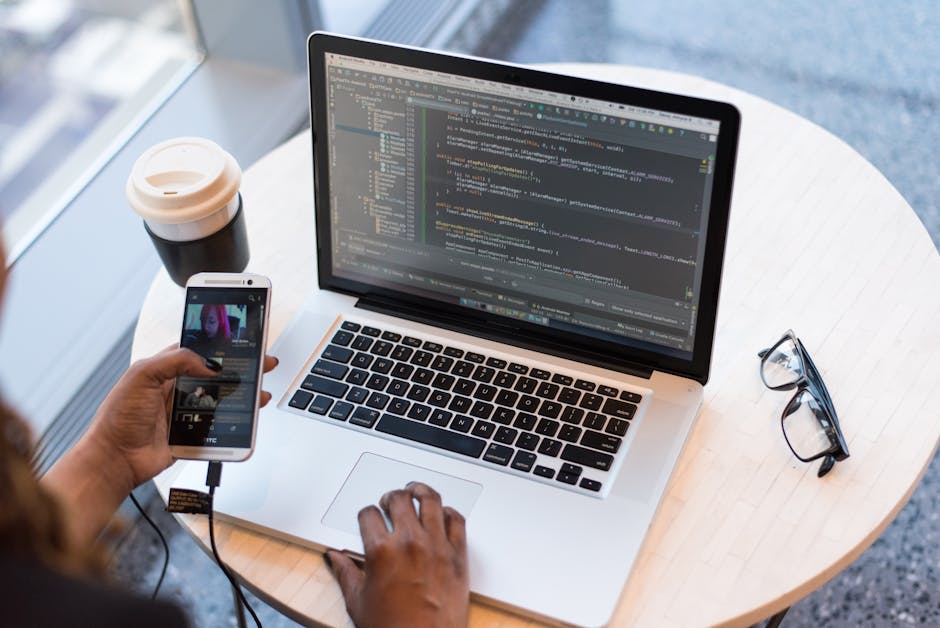 Code editor with Python syntax highlighted on a laptop screen